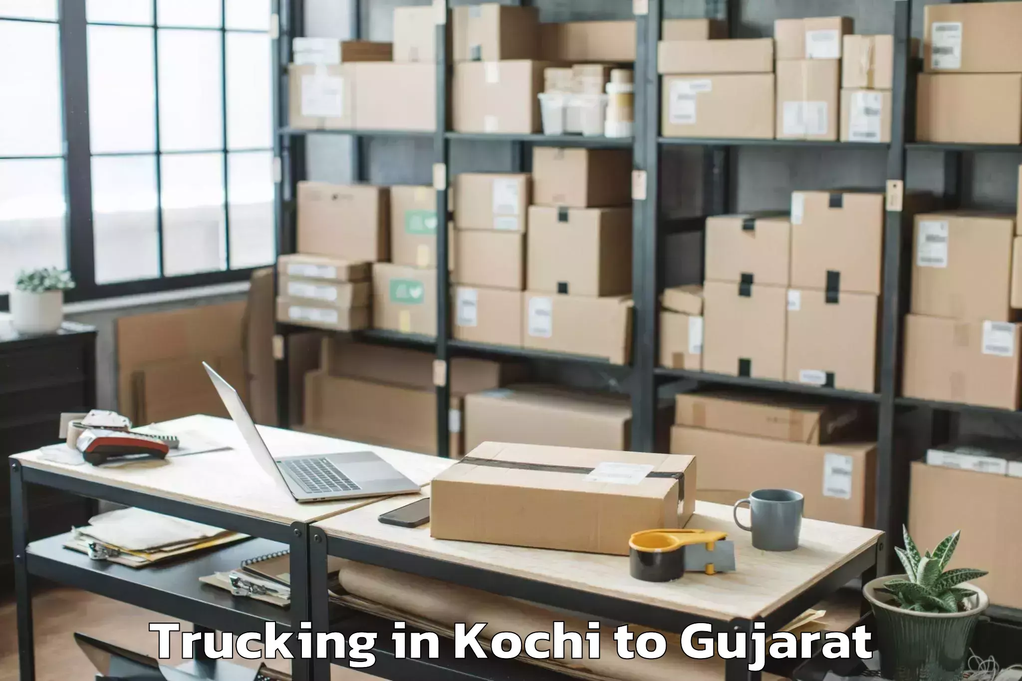 Top Kochi to Keshod Trucking Available